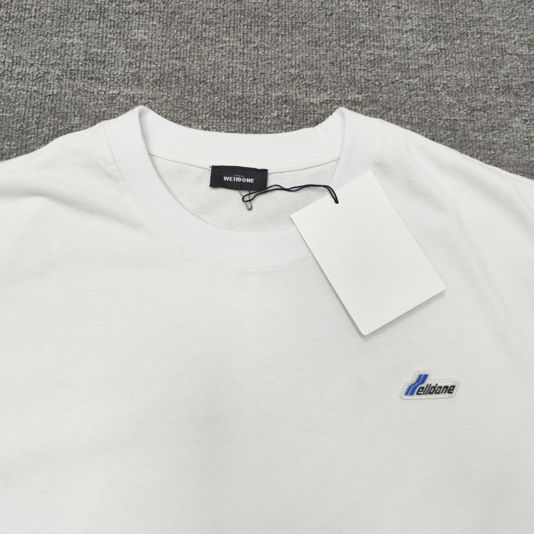 WE11D0NE Embroidered Logo Simple Color T-Shirt